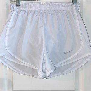 White Nike shorts